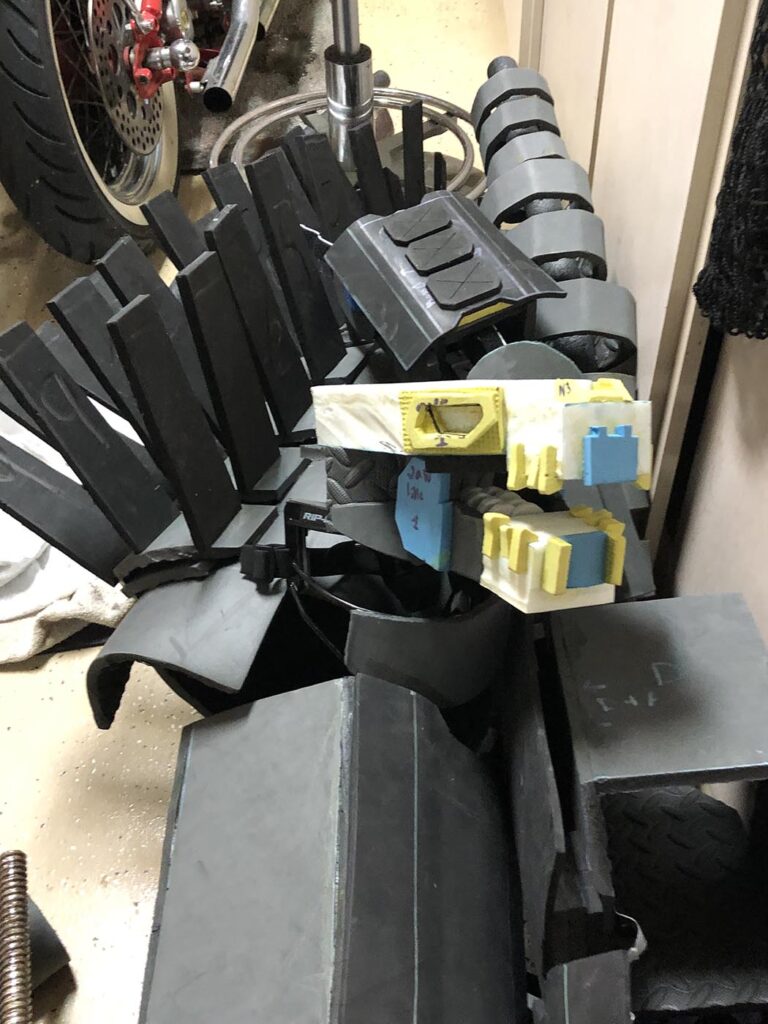 GvK Mechagodzilla - Body parts stacked off to the side of the garage.